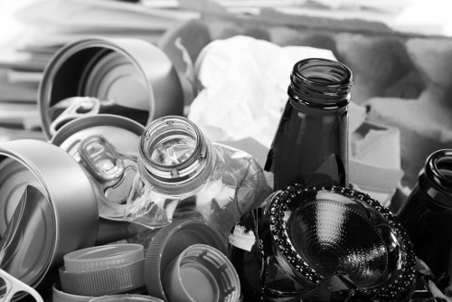 Front view of commercial waste collection area in Battersea with accessibility signage